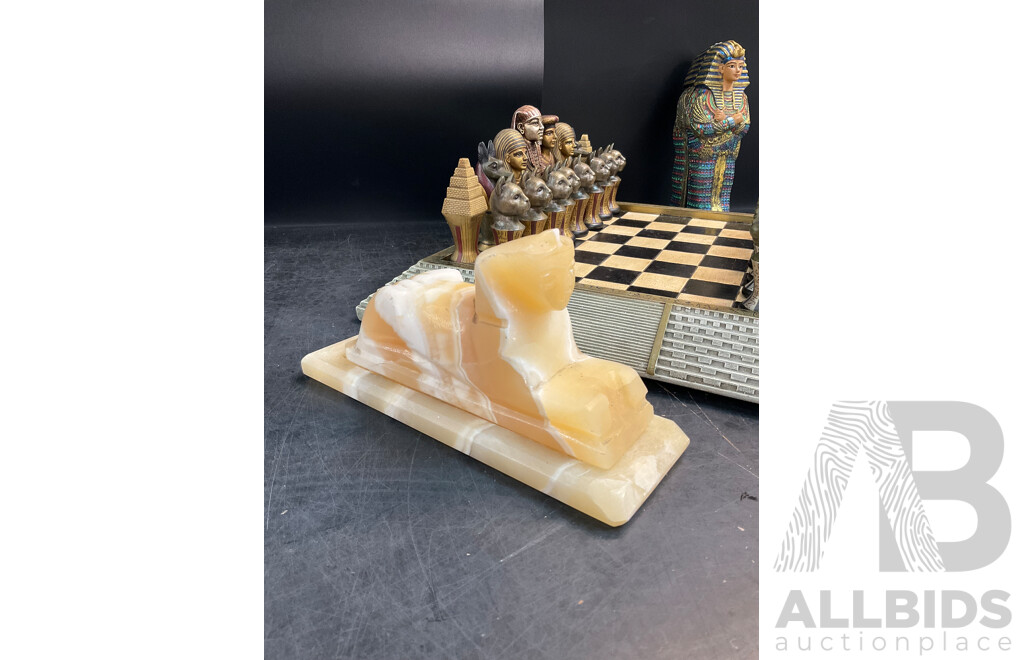 Assorted Egyptian Themed Items, Including Composite Chess Set, Sarcophagus and Onyx Sphinx Statue - Lot of 3