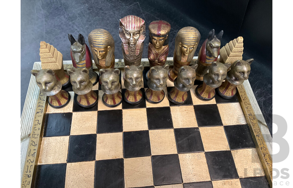 Assorted Egyptian Themed Items, Including Composite Chess Set, Sarcophagus and Onyx Sphinx Statue - Lot of 3