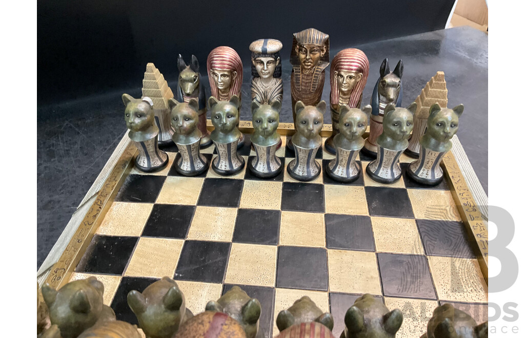Assorted Egyptian Themed Items, Including Composite Chess Set, Sarcophagus and Onyx Sphinx Statue - Lot of 3