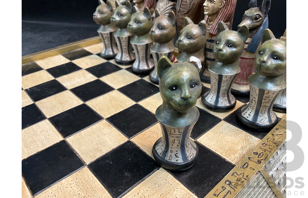 Assorted Egyptian Themed Items, Including Composite Chess Set, Sarcophagus and Onyx Sphinx Statue - Lot of 3