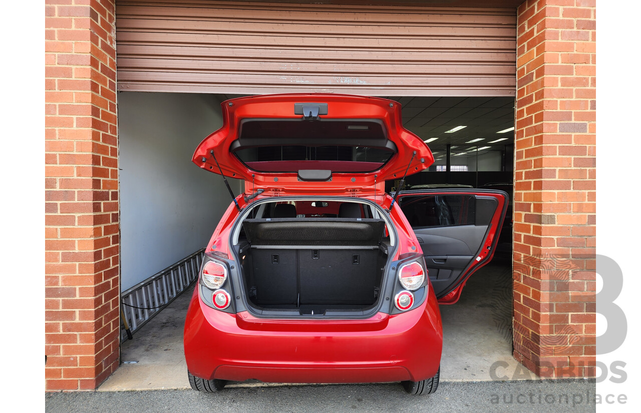 3/2012 Holden Barina  TM 5d Hatchback Red 1.6L