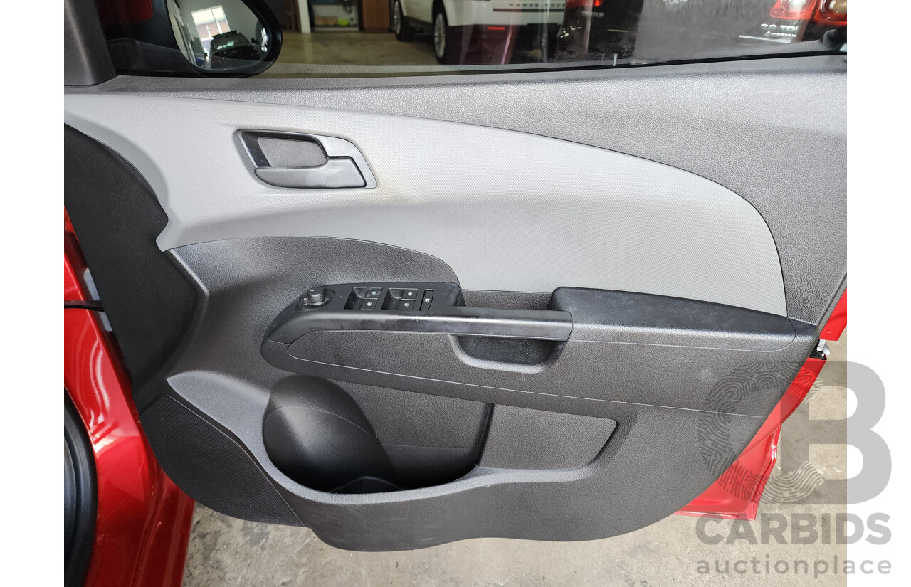 3/2012 Holden Barina  TM 5d Hatchback Red 1.6L