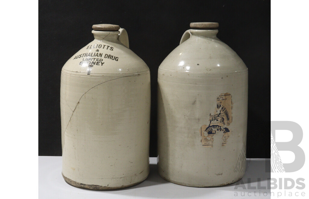 Two Large Vintage Australian Demi Johns with Stoppers