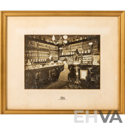 Artist Unknown, (1880s), Wonderful Antique Photograph of an Apothecary with Lady Seated & Man Behind Counter (1886), 28 x 33 cm (frame)