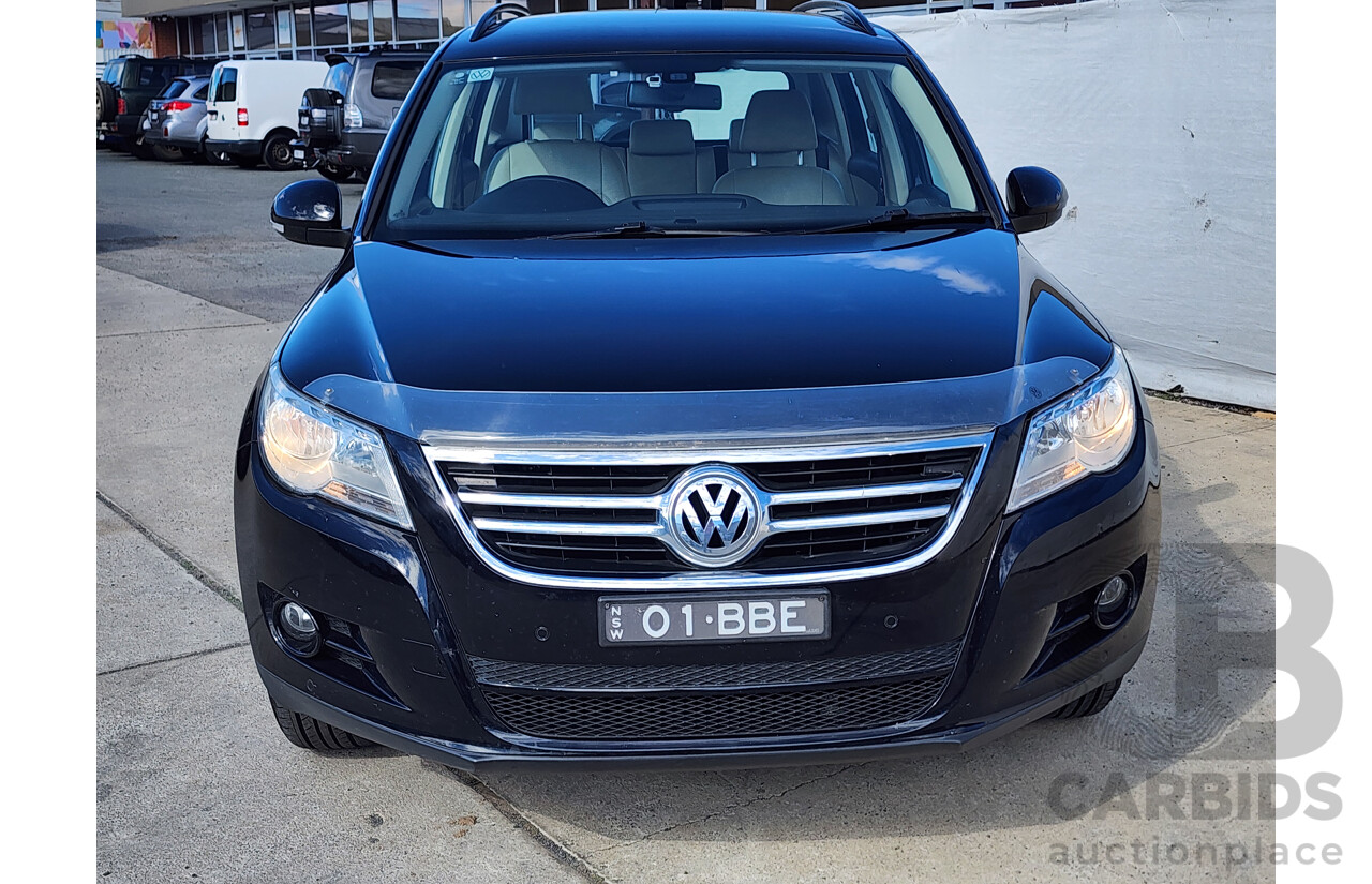 6/2011 Volkswagen Tiguan 103 TDI 5NC MY11 4d Wagon Black 2.0L