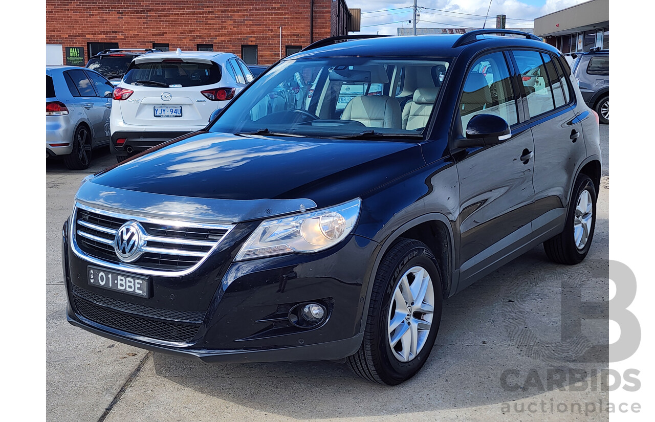 6/2011 Volkswagen Tiguan 103 TDI 5NC MY11 4d Wagon Black 2.0L