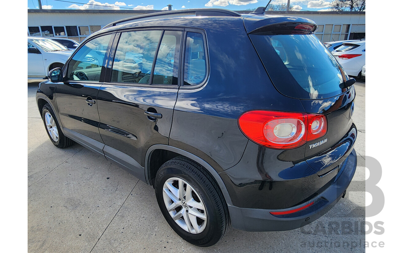 6/2011 Volkswagen Tiguan 103 TDI 5NC MY11 4d Wagon Black 2.0L
