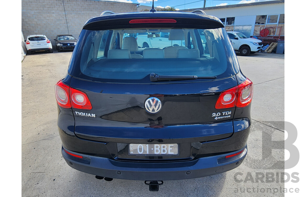 6/2011 Volkswagen Tiguan 103 TDI 5NC MY11 4d Wagon Black 2.0L