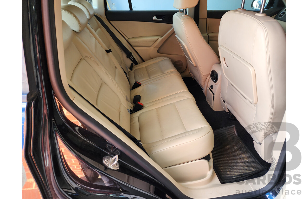 6/2011 Volkswagen Tiguan 103 TDI 5NC MY11 4d Wagon Black 2.0L