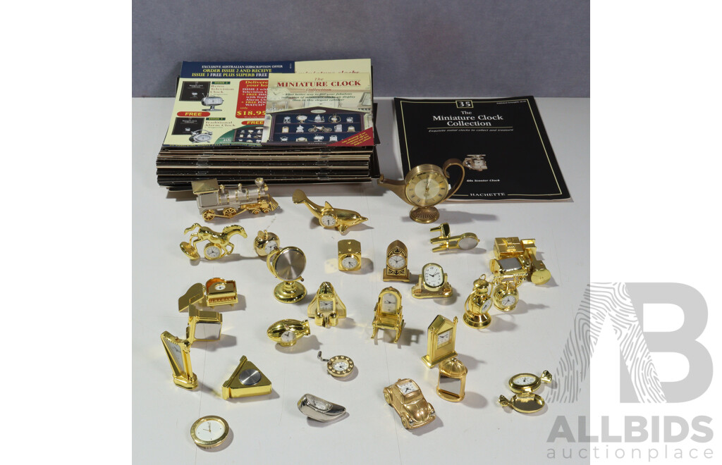 Large Collection Miniature Clocks by Hachette with Accompanying Booklets Along with Other Miniature Clocks