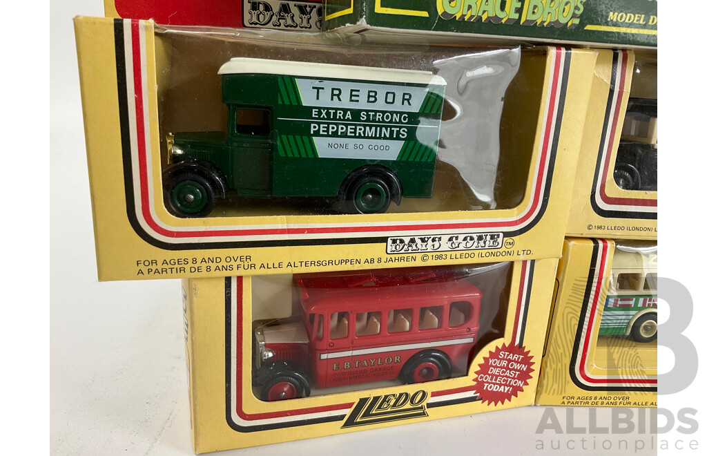 Eight Lledo Days Gone Diecast Horse Drawn Vehicles and Buses and Fire Truck with Grace Bros Horse Drawn Carts