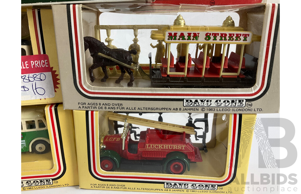 Eight Lledo Days Gone Diecast Horse Drawn Vehicles and Buses and Fire Truck with Grace Bros Horse Drawn Carts