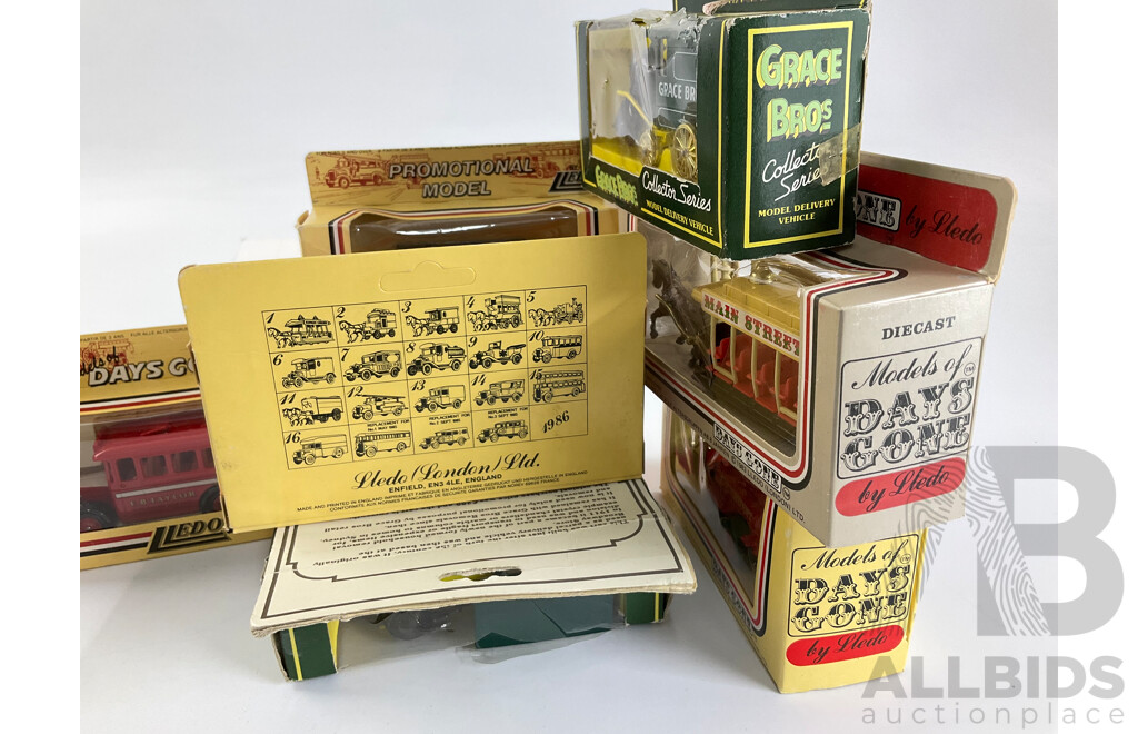 Eight Lledo Days Gone Diecast Horse Drawn Vehicles and Buses and Fire Truck with Grace Bros Horse Drawn Carts