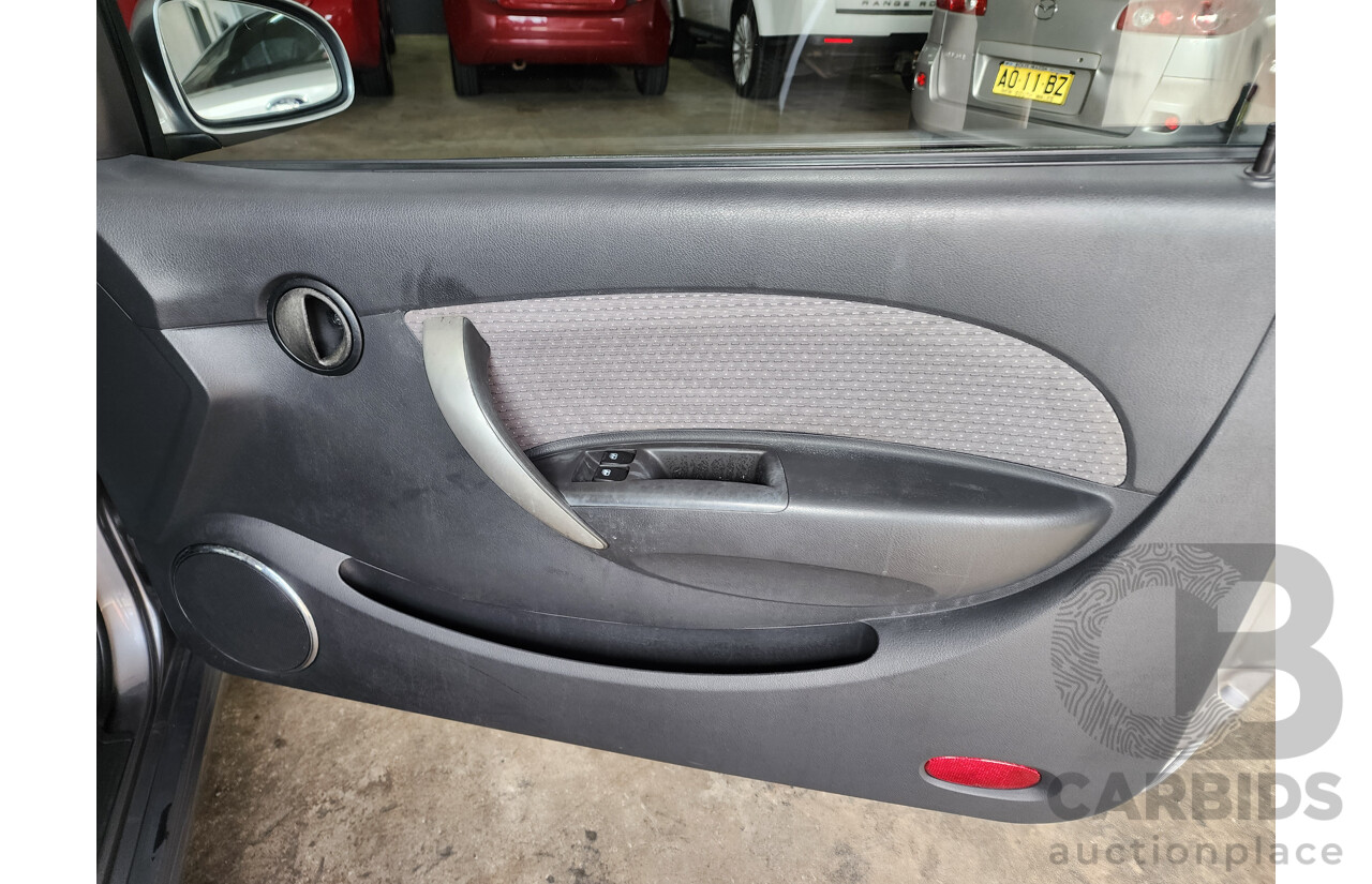 11/2008 Holden Barina  TK MY09 3d Hatchback Grey 1.6L