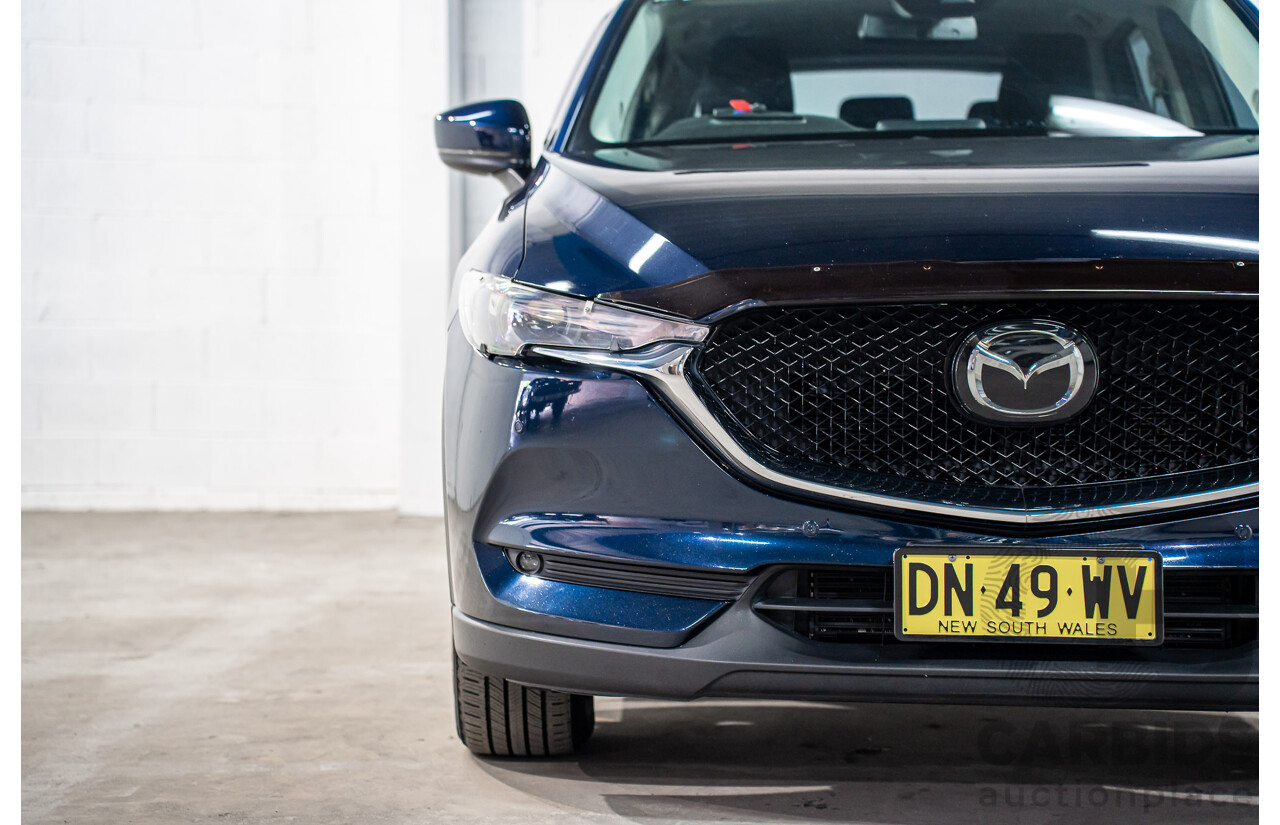 11/2019 Mazda CX-5 Touring (AWD) MY19 KF Series 2 4d Wagon Deep Crystal Blue Metallic Turbo Diesel 2.2L