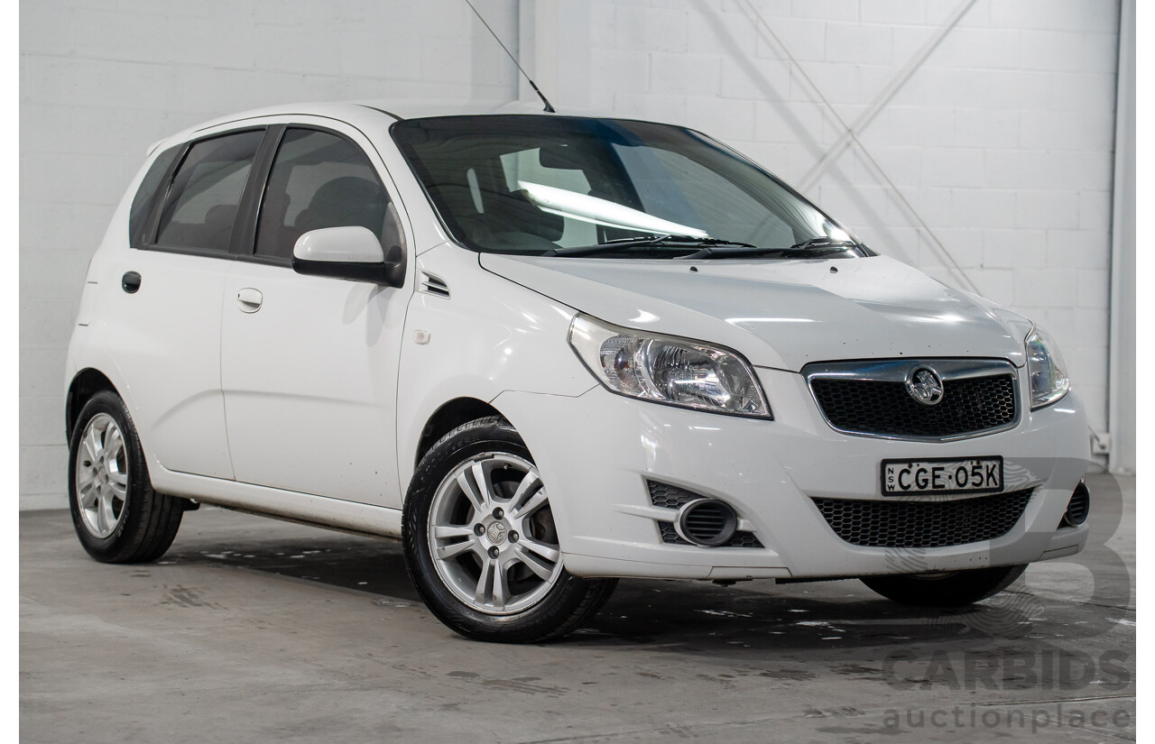 11/2011 Holden Barina TK MY11 5d Hatchback Olympic White 1.6L
