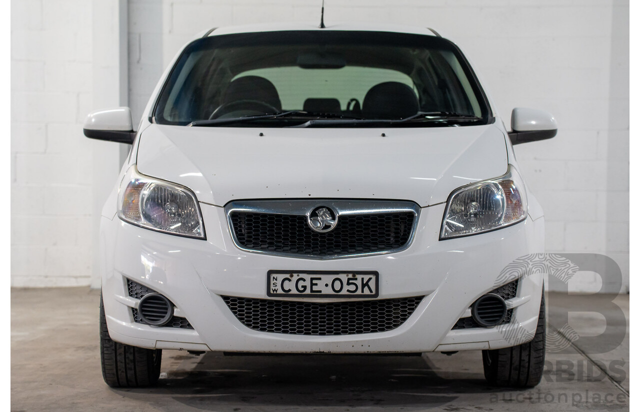 11/2011 Holden Barina TK MY11 5d Hatchback Olympic White 1.6L