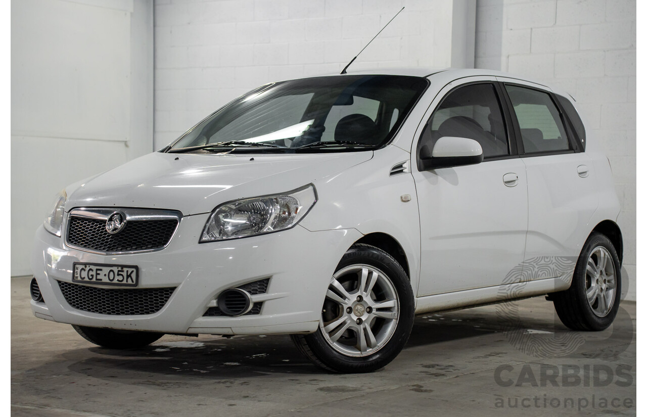 11/2011 Holden Barina TK MY11 5d Hatchback Olympic White 1.6L