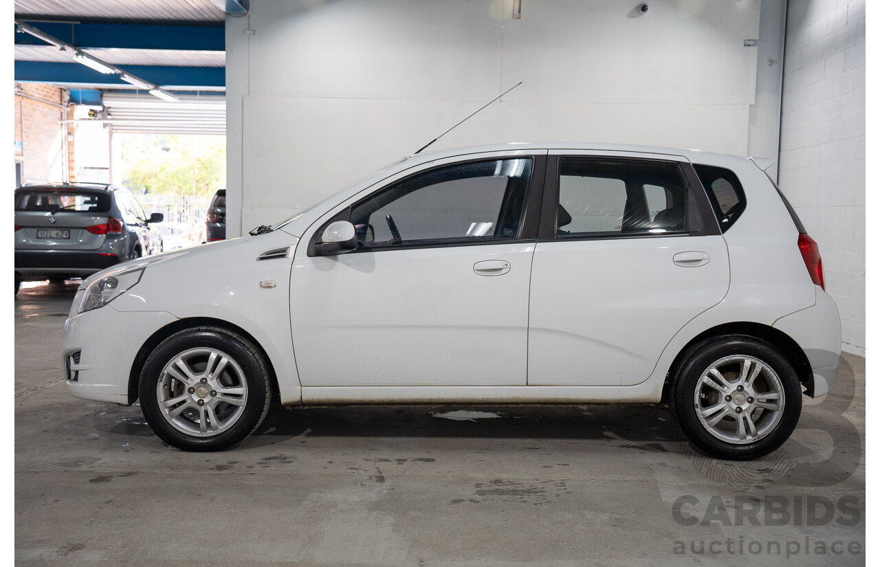 11/2011 Holden Barina TK MY11 5d Hatchback Olympic White 1.6L