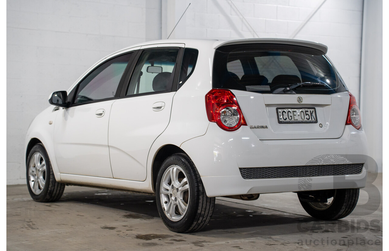 11/2011 Holden Barina TK MY11 5d Hatchback Olympic White 1.6L