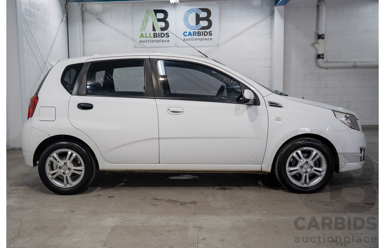 11/2011 Holden Barina TK MY11 5d Hatchback Olympic White 1.6L