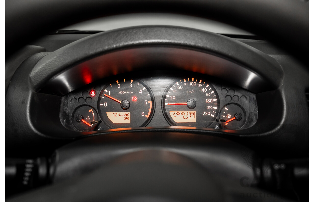 3/2013 Nissan Navara RX (4x2) D40 MY13 Dual Cab P/Up Cosmic Black Metallic Turbo Diesel 2.5L