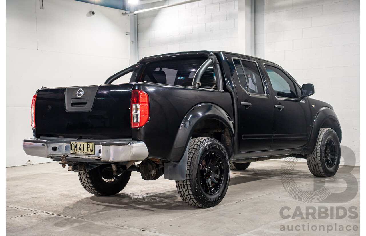 3/2013 Nissan Navara RX (4x2) D40 MY13 Dual Cab P/Up Cosmic Black Metallic Turbo Diesel 2.5L