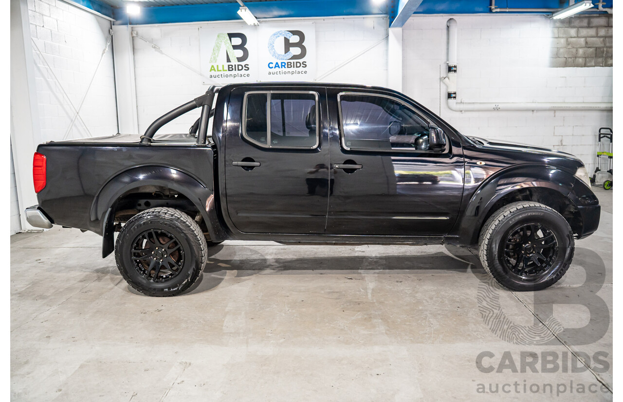 3/2013 Nissan Navara RX (4x2) D40 MY13 Dual Cab P/Up Cosmic Black Metallic Turbo Diesel 2.5L