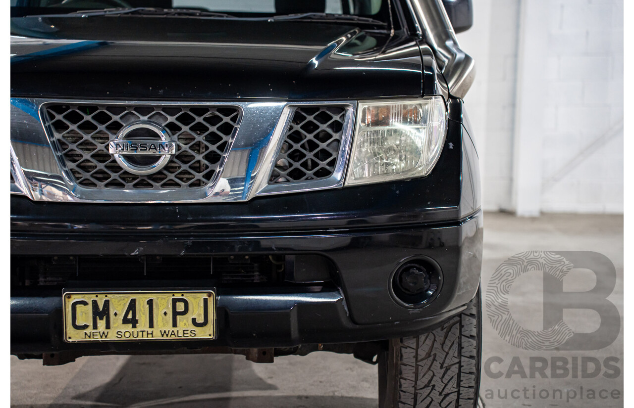 3/2013 Nissan Navara RX (4x2) D40 MY13 Dual Cab P/Up Cosmic Black Metallic Turbo Diesel 2.5L