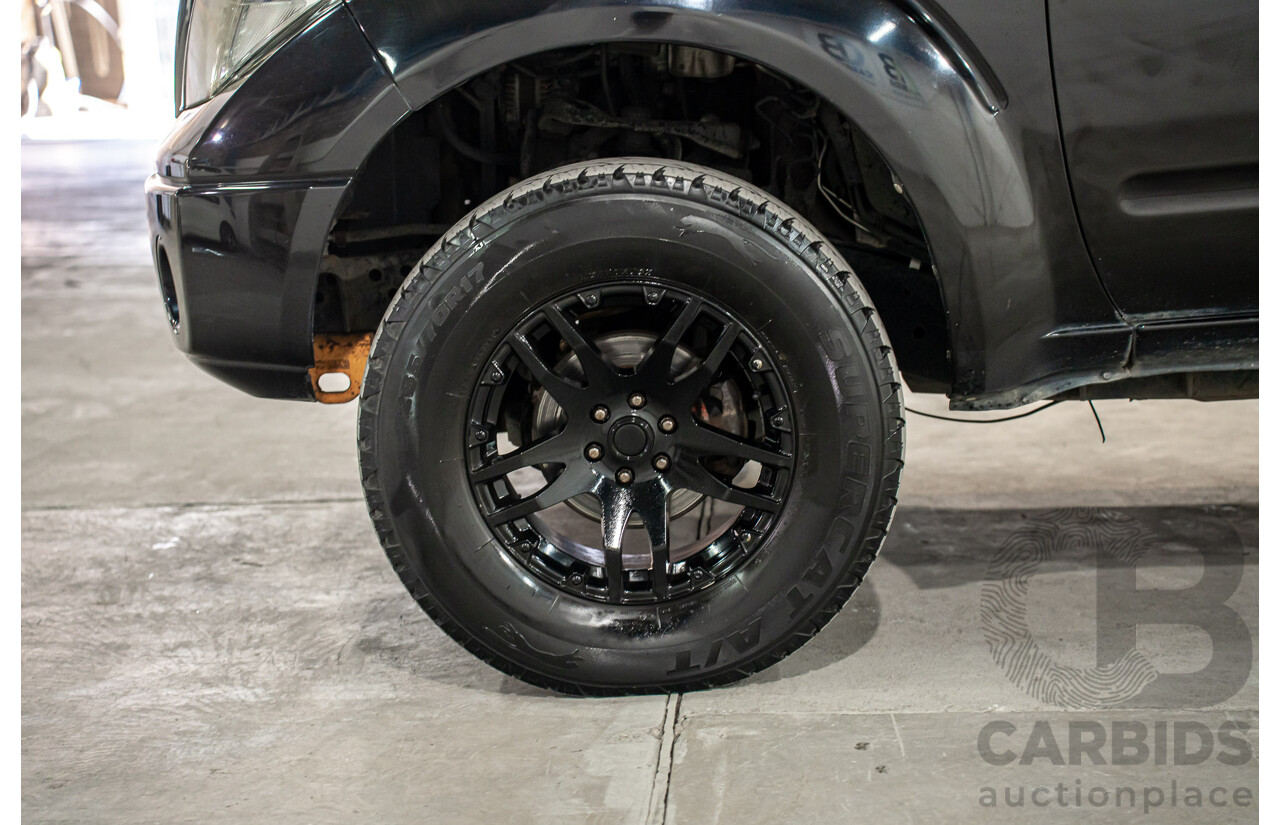 3/2013 Nissan Navara RX (4x2) D40 MY13 Dual Cab P/Up Cosmic Black Metallic Turbo Diesel 2.5L