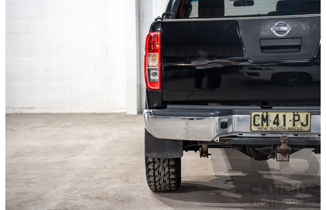 3/2013 Nissan Navara RX (4x2) D40 MY13 Dual Cab P/Up Cosmic Black Metallic Turbo Diesel 2.5L