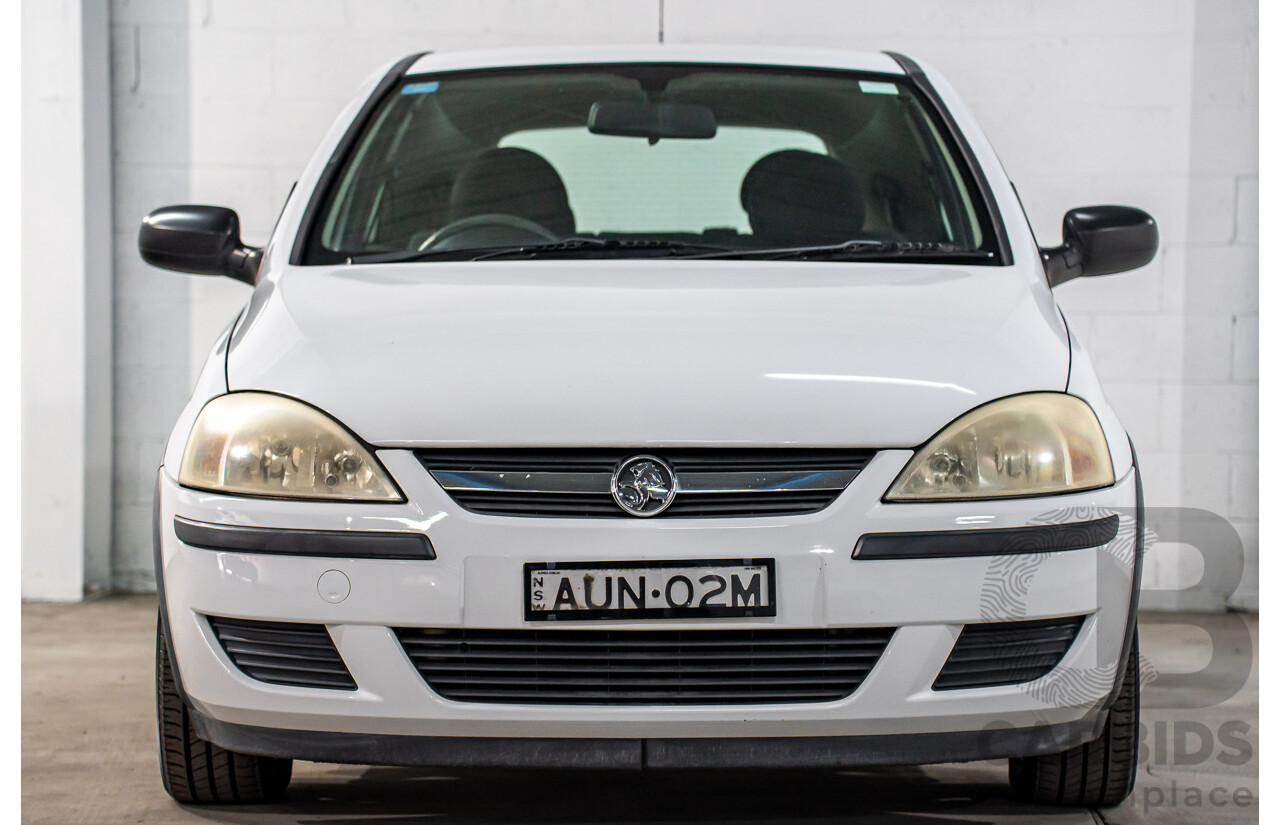 7/2005 Holden Barina XC MY04.5 3d Hatchback Casablanca White 1.4L