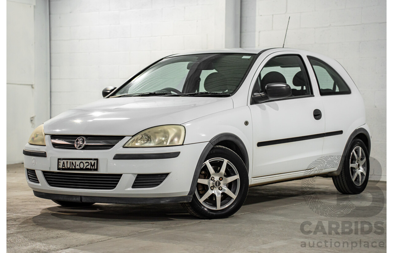 7/2005 Holden Barina XC MY04.5 3d Hatchback Casablanca White 1.4L
