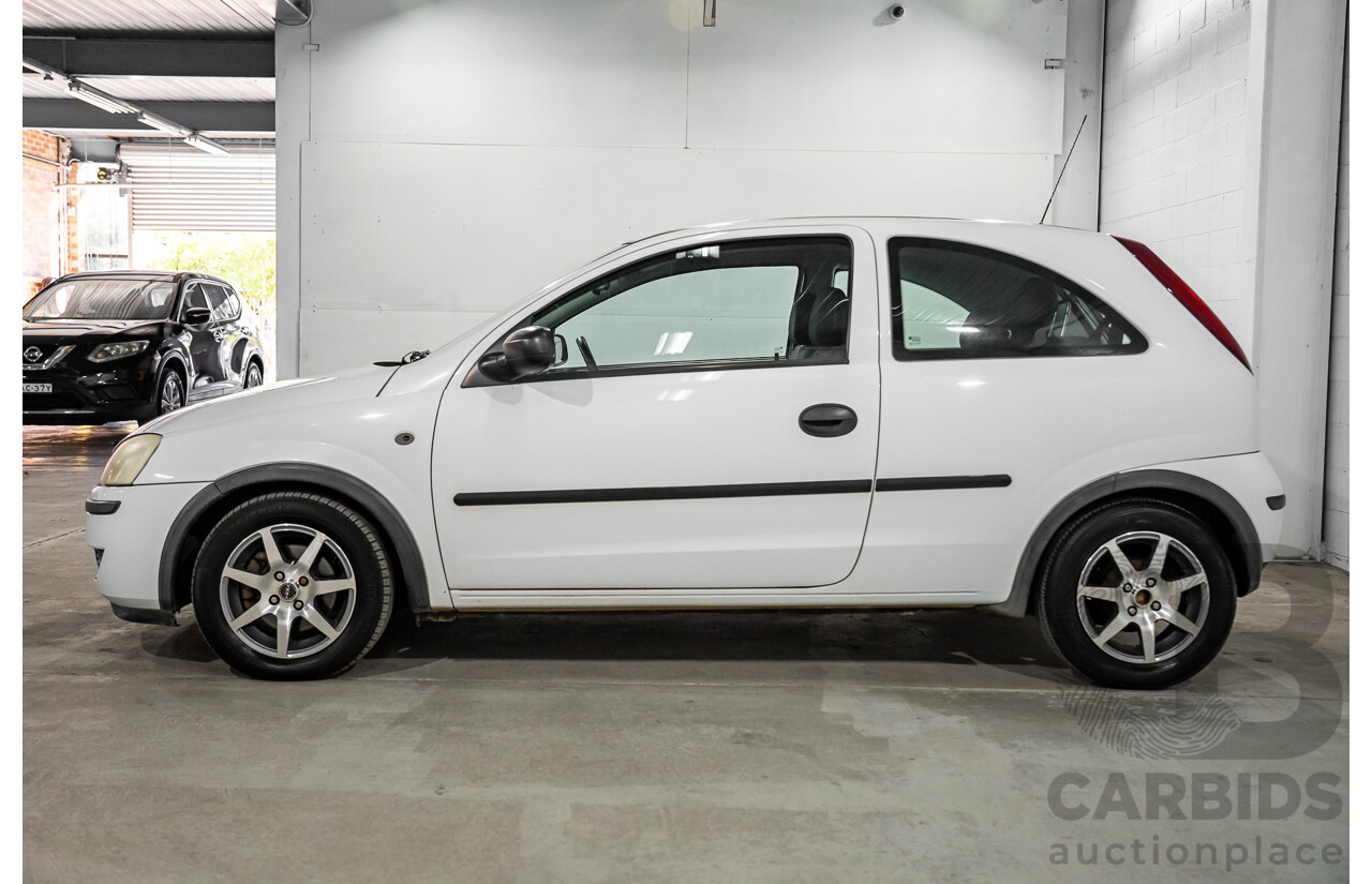 7/2005 Holden Barina XC MY04.5 3d Hatchback Casablanca White 1.4L