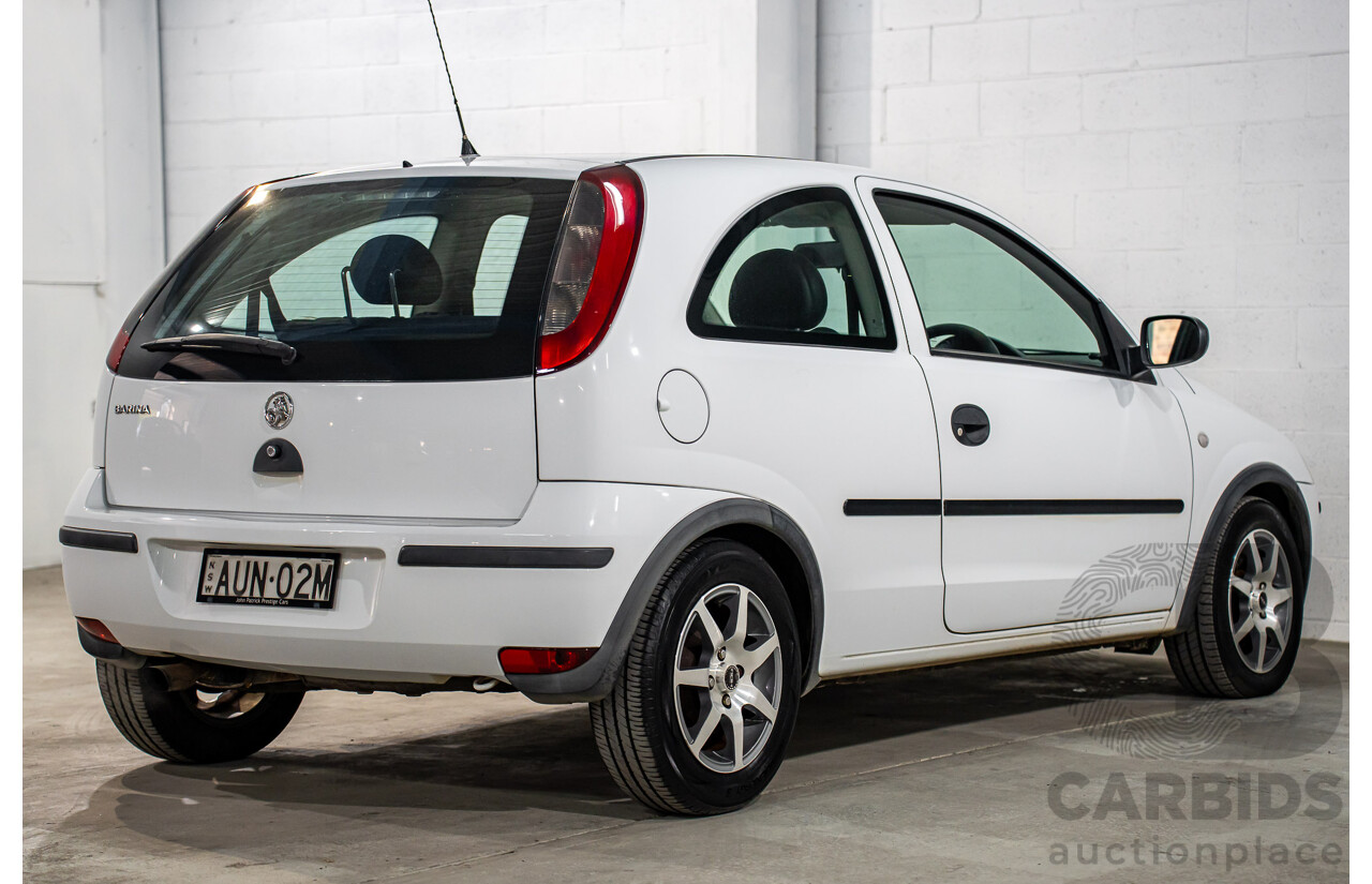 7/2005 Holden Barina XC MY04.5 3d Hatchback Casablanca White 1.4L