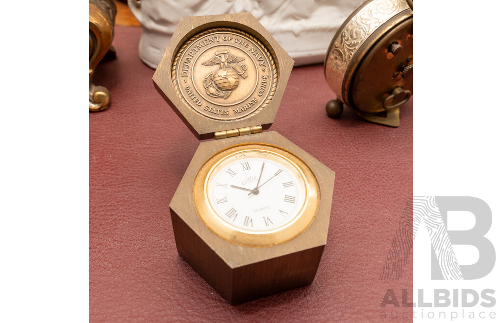 Collection Five Clocks Including Small Brass US Navy Example, Two Reproduction Gilt Style Examples and Bisque Example with Cherub Detail