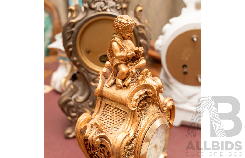 Collection Five Clocks Including Small Brass US Navy Example, Two Reproduction Gilt Style Examples and Bisque Example with Cherub Detail