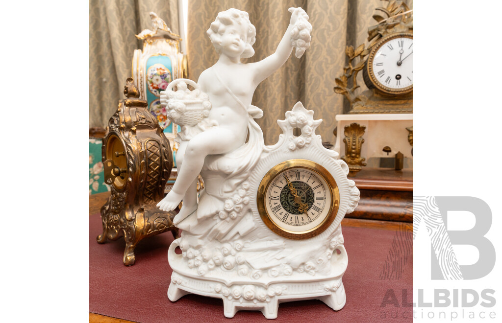Collection Five Clocks Including Small Brass US Navy Example, Two Reproduction Gilt Style Examples and Bisque Example with Cherub Detail