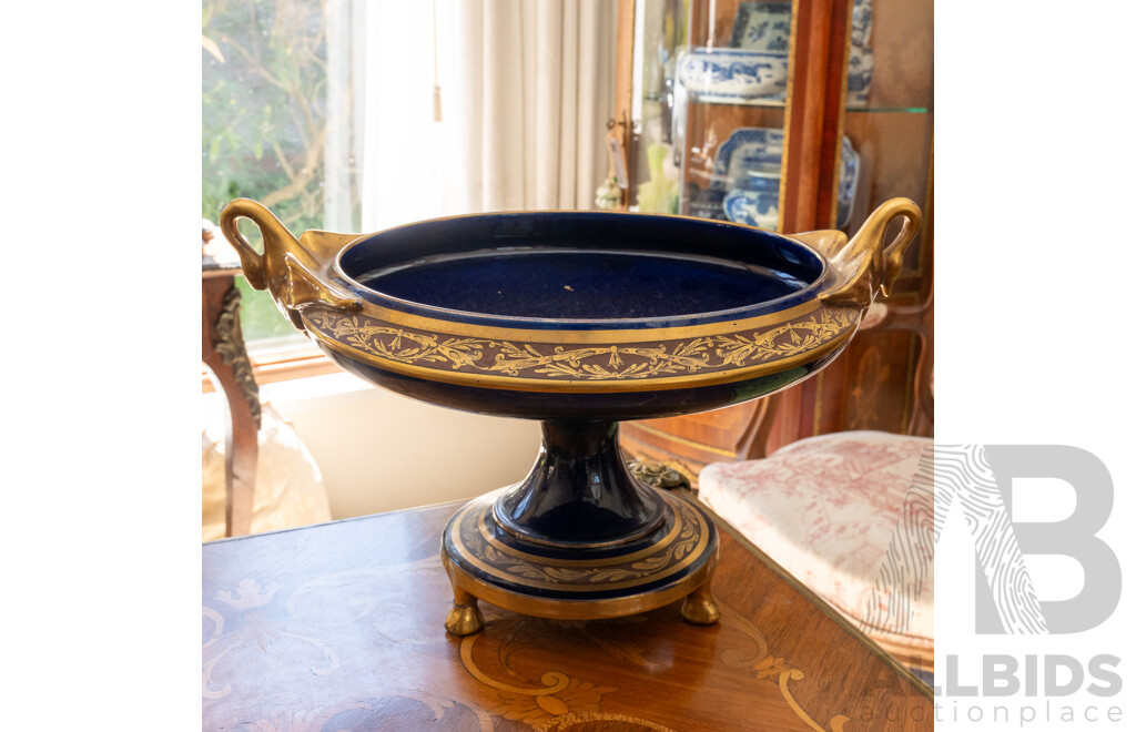 Large Antique French Limoges Porcelain Centerpiece Dish with Twin Swan Form Handles, Gilt Decoration and Four Footed Pedestal Base