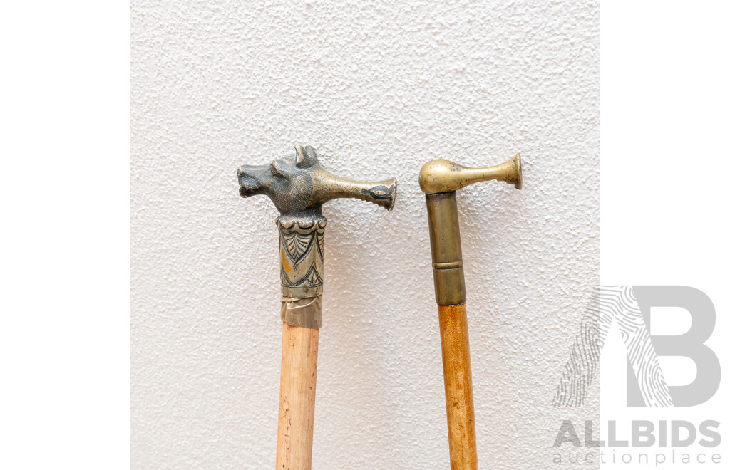Two Vintage Swagger Sticks Comprising Silver Plate Dog Head Example