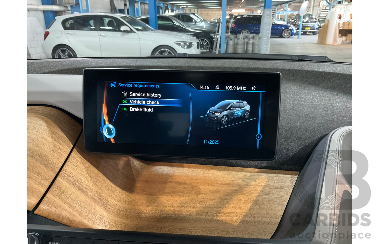05/2015 BMW i3 REx Hybrid (RWD) IO1 4d Hatchback Solar Orange Metallic/Fluid Black 0.6L - 125kW