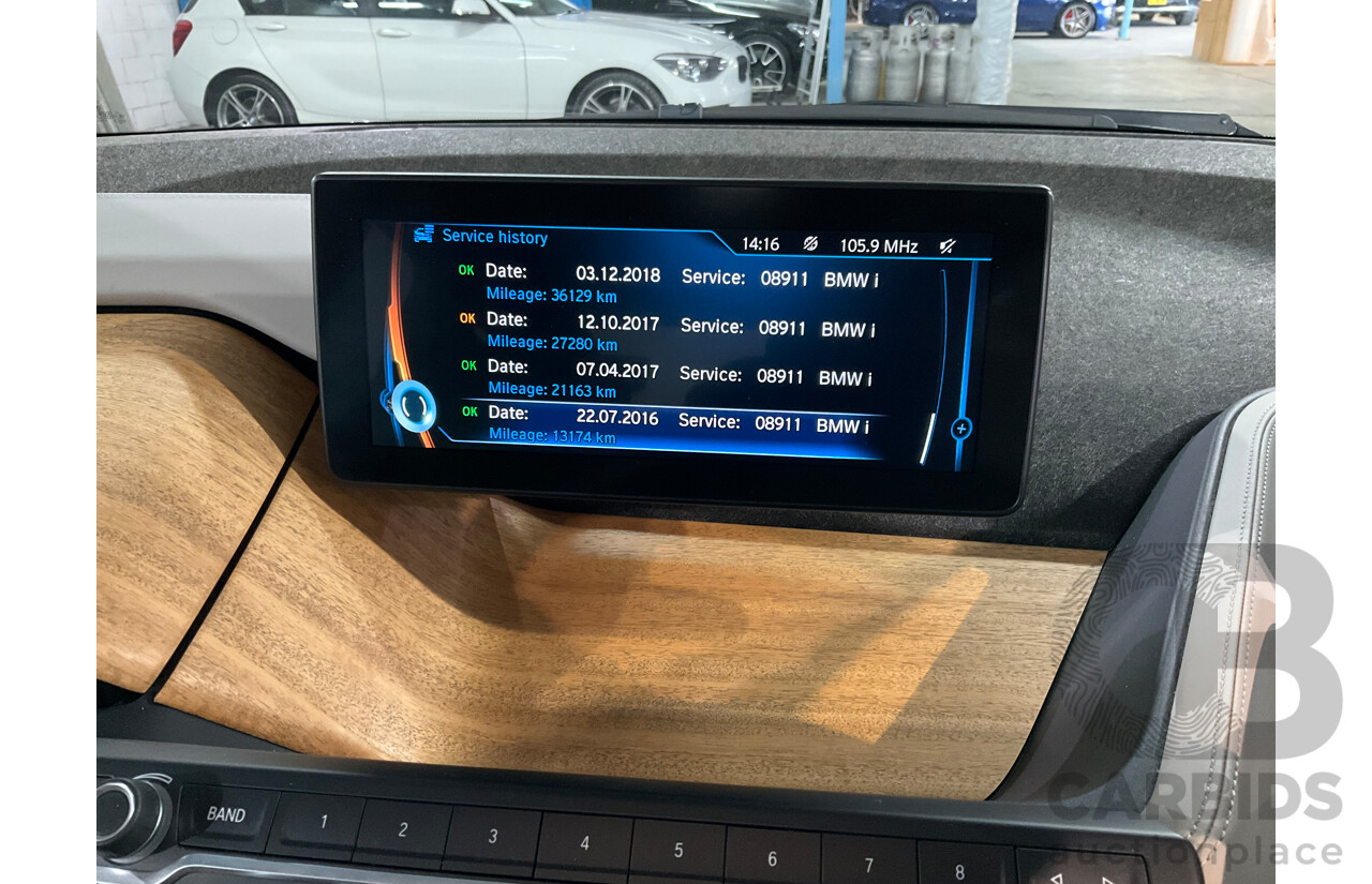 05/2015 BMW i3 REx Hybrid (RWD) IO1 4d Hatchback Solar Orange Metallic/Fluid Black 0.6L - 125kW