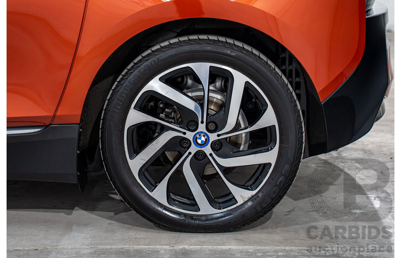 05/2015 BMW i3 REx Hybrid (RWD) IO1 4d Hatchback Solar Orange Metallic/Fluid Black 0.6L - 125kW