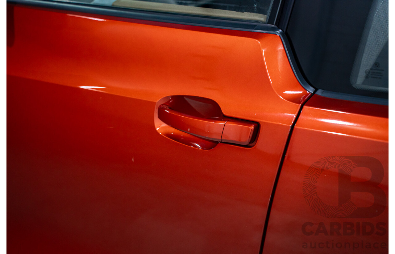 05/2015 BMW i3 REx Hybrid (RWD) IO1 4d Hatchback Solar Orange Metallic/Fluid Black 0.6L - 125kW
