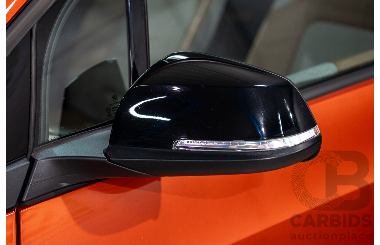 05/2015 BMW i3 REx Hybrid (RWD) IO1 4d Hatchback Solar Orange Metallic/Fluid Black 0.6L - 125kW