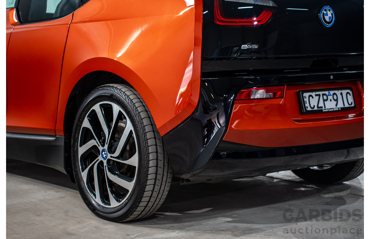 05/2015 BMW i3 REx Hybrid (RWD) IO1 4d Hatchback Solar Orange Metallic/Fluid Black 0.6L - 125kW