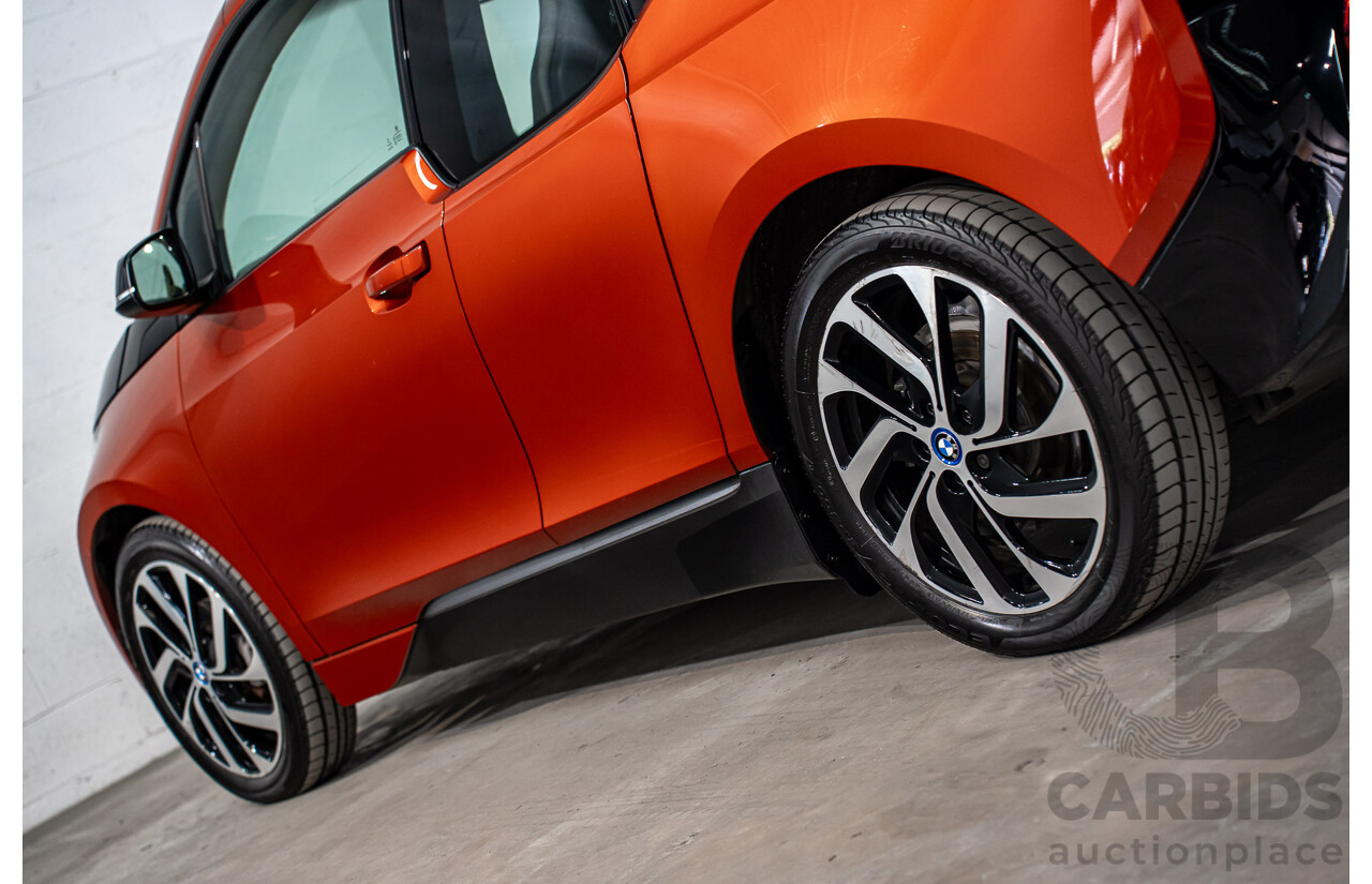 05/2015 BMW i3 REx Hybrid (RWD) IO1 4d Hatchback Solar Orange Metallic/Fluid Black 0.6L - 125kW