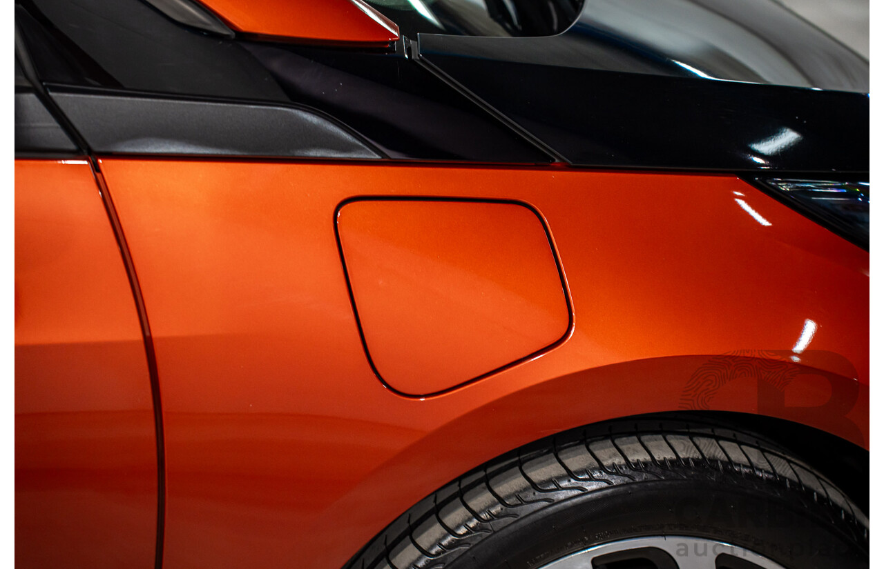 05/2015 BMW i3 REx Hybrid (RWD) IO1 4d Hatchback Solar Orange Metallic/Fluid Black 0.6L - 125kW