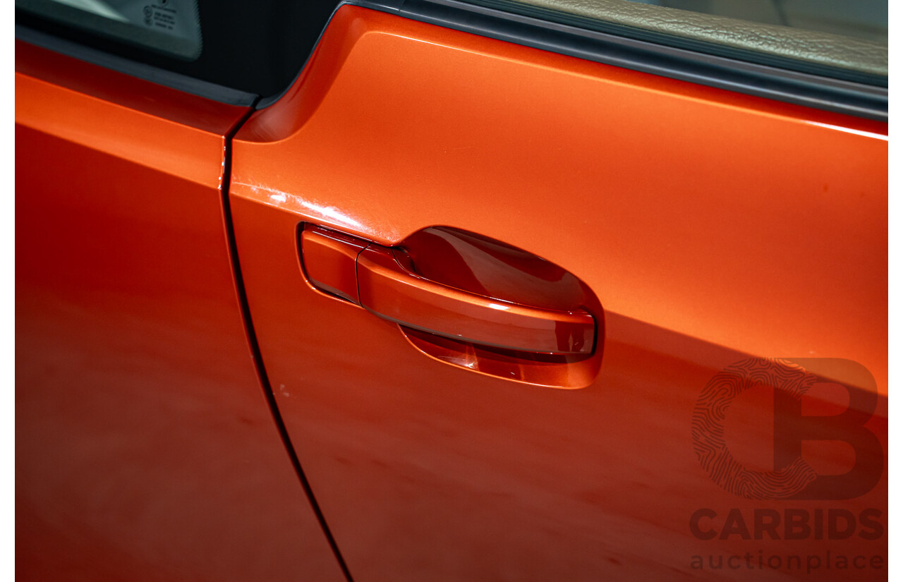 05/2015 BMW i3 REx Hybrid (RWD) IO1 4d Hatchback Solar Orange Metallic/Fluid Black 0.6L - 125kW