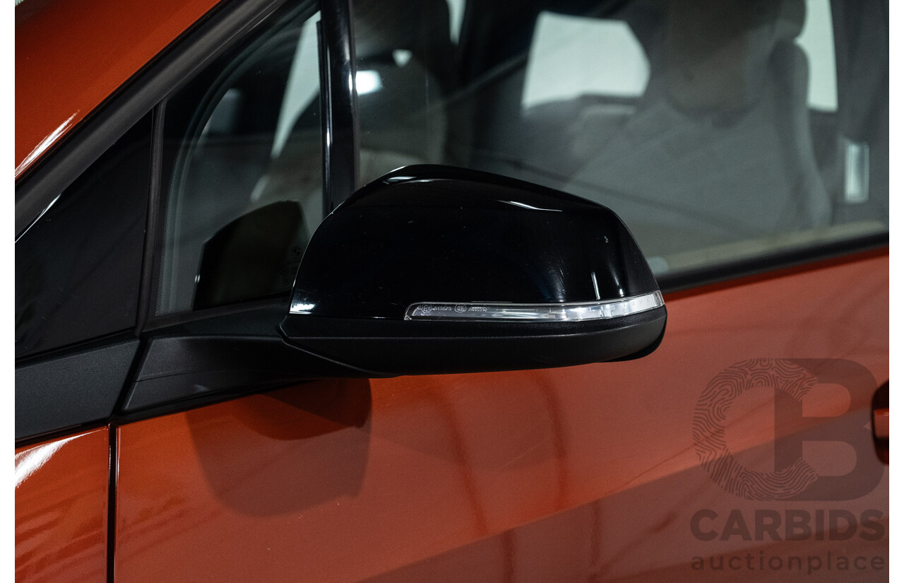 05/2015 BMW i3 REx Hybrid (RWD) IO1 4d Hatchback Solar Orange Metallic/Fluid Black 0.6L - 125kW